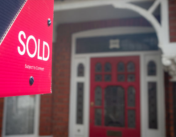 Image showing a close up of a sold sign outside of a house